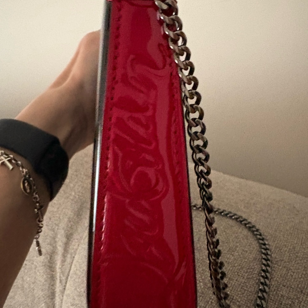 Vibrant Red Crossbody Bag with Glossy Finish and Gold Chain Strap